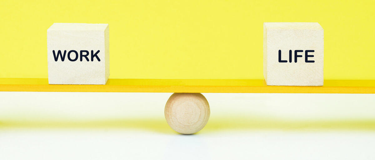 Concept of work life balance. Work life text in wooden blocks. © jayk7 / getty images