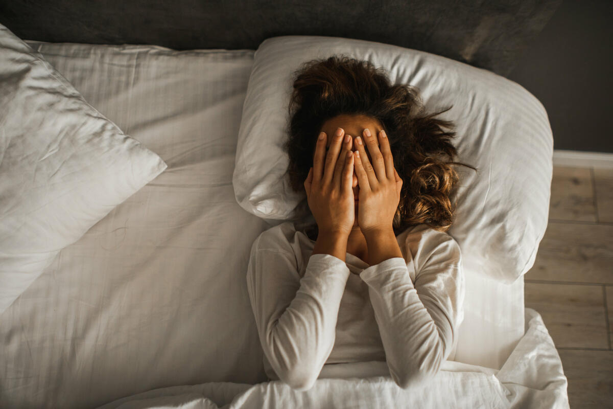 Frau liegt im Bett © Oleg Breslavtsev / Getty Images / Not known